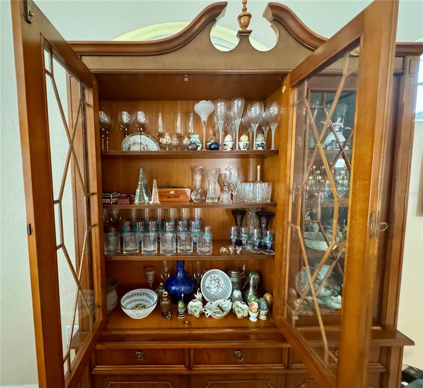 5688 Legend Hills Lane Spring Hill, FL 34609 - Photo 66 of 74 a room with lots of different colored cloths