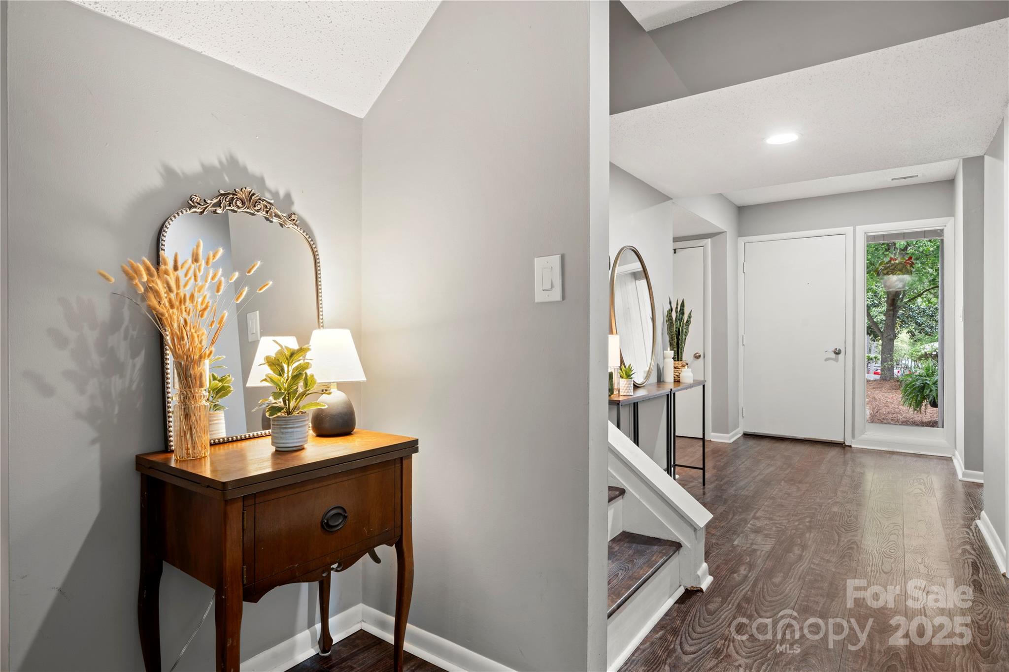 181 Riverview Terrace Clover, SC 29710 - Photo 15 of 43 a view of a workspace room with wooden floor windows and a kitchen