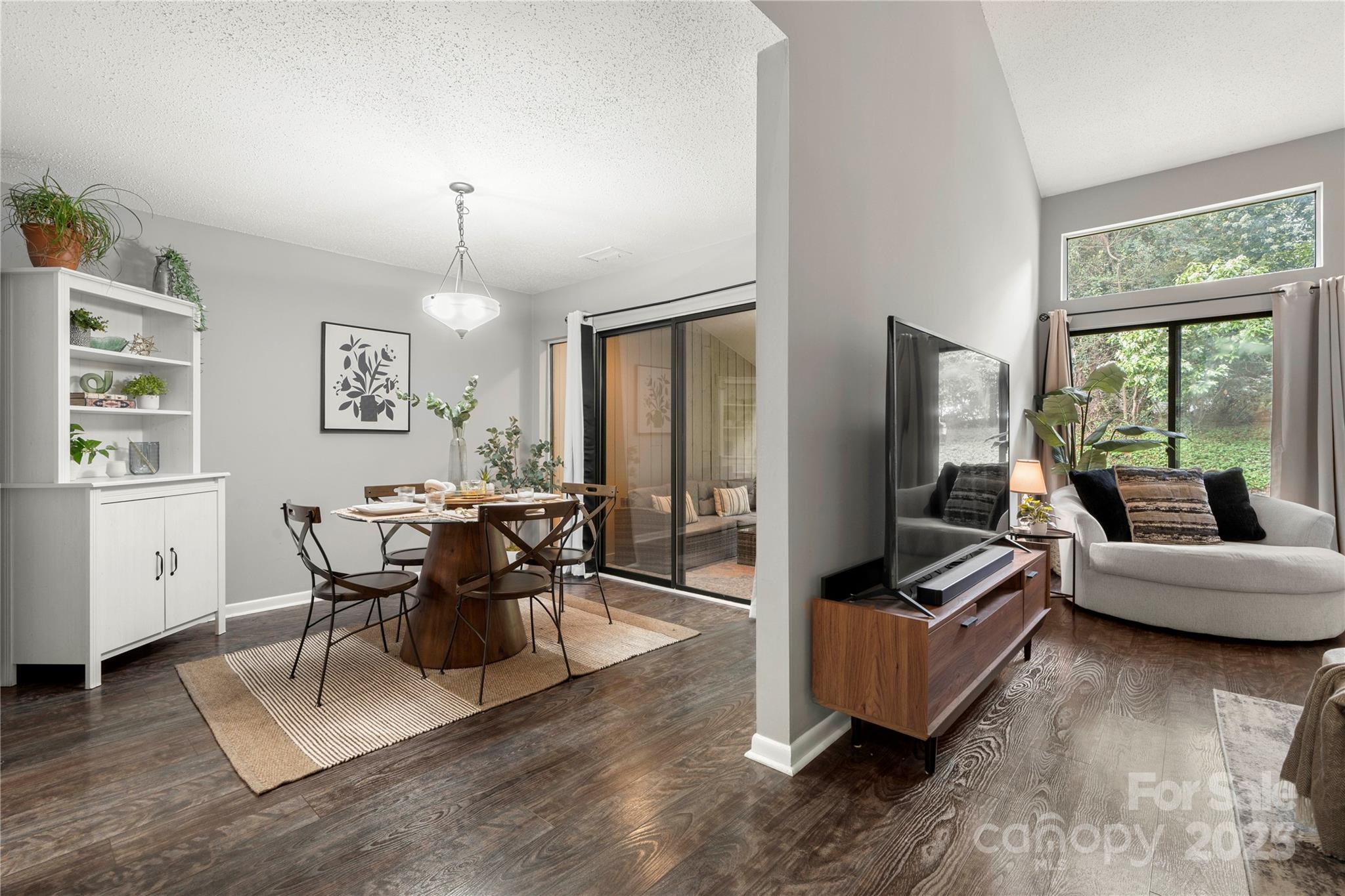 181 Riverview Terrace Clover, SC 29710 - Photo 20 of 43 a living room with furniture a large window and a flat screen tv
