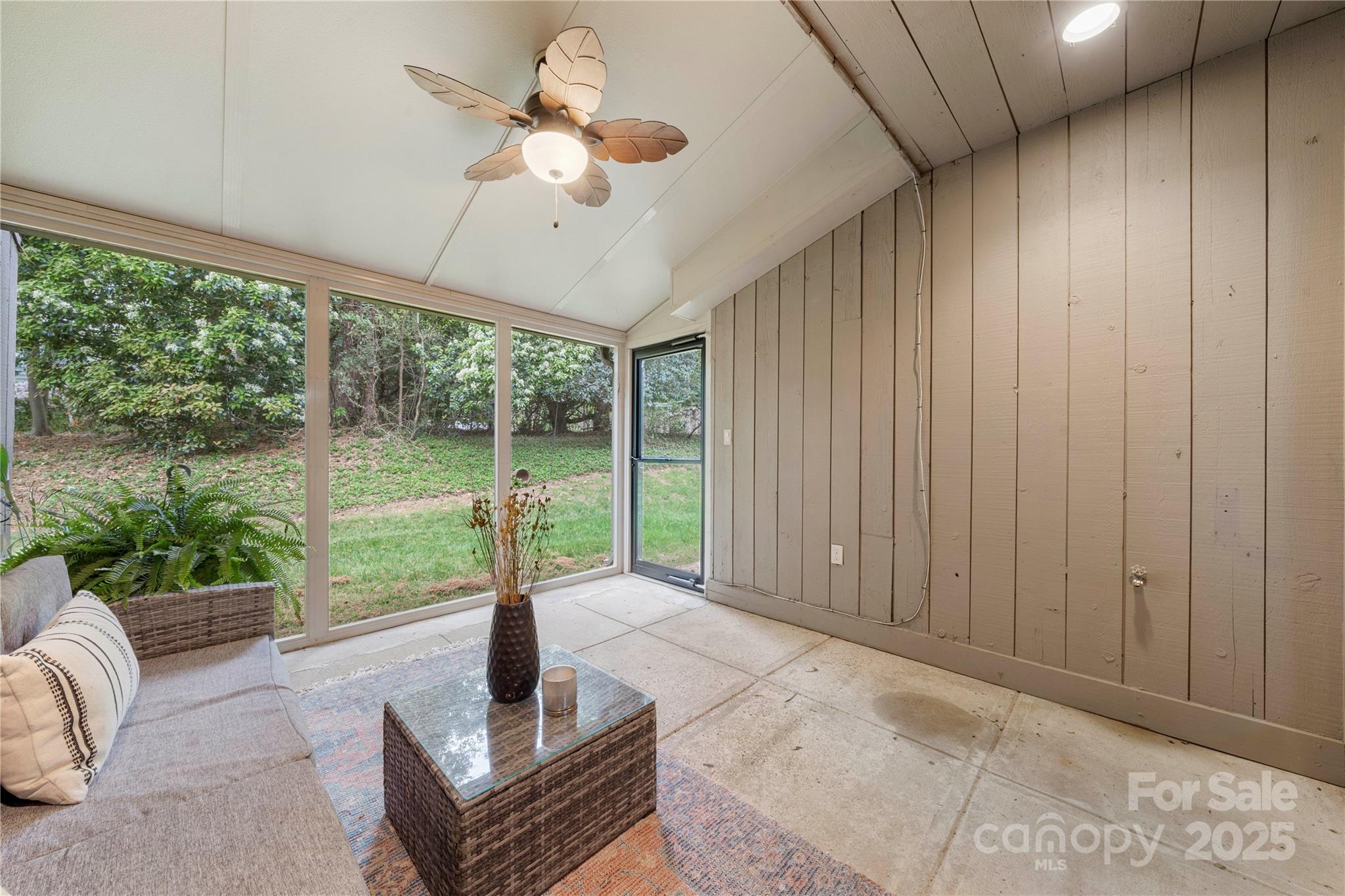 181 Riverview Terrace Clover, SC 29710 - Photo 24 of 43 a living room with furniture and a floor to ceiling window