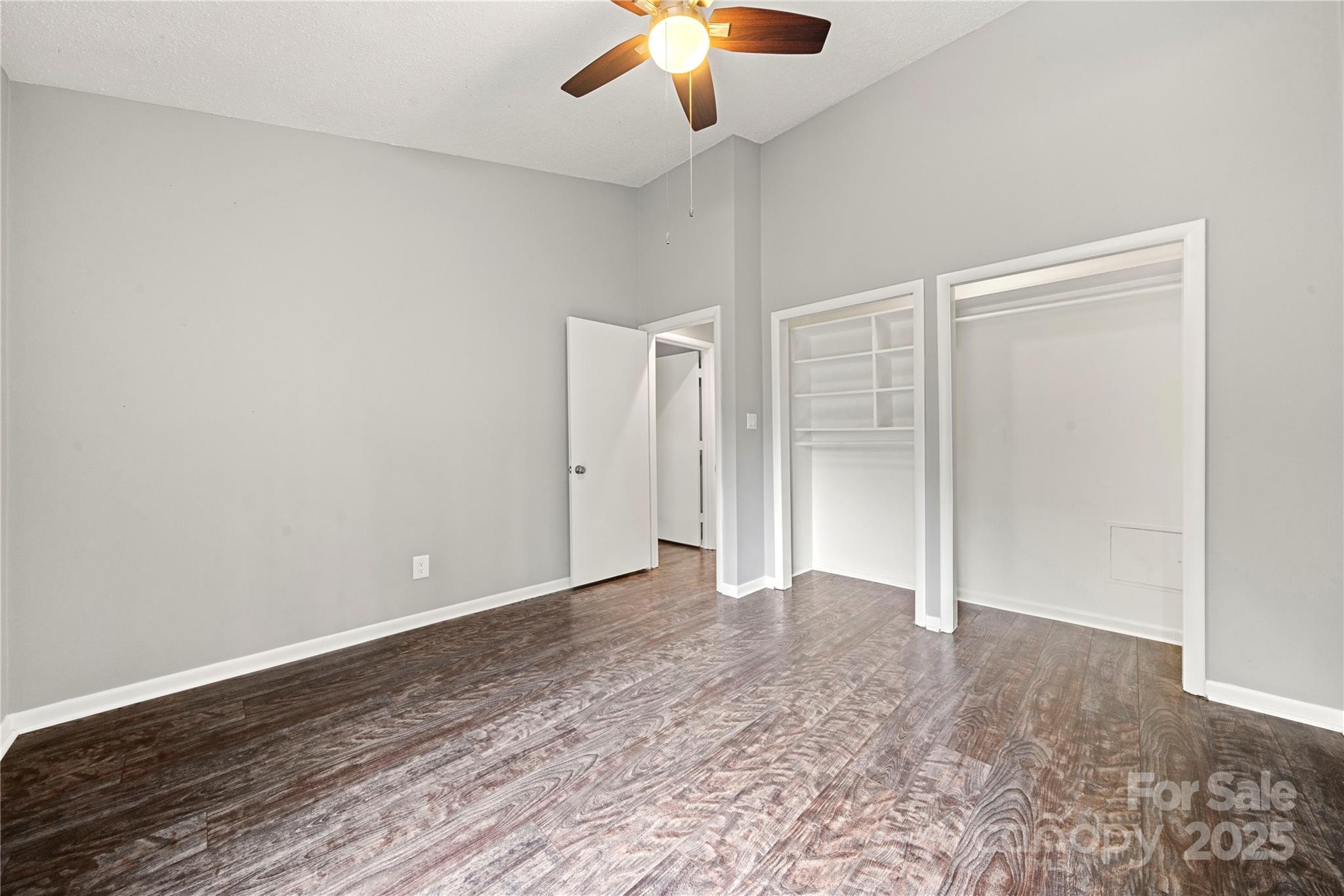 181 Riverview Terrace Clover, SC 29710 - Photo 30 of 43 an empty room with closet and a chandelier fan