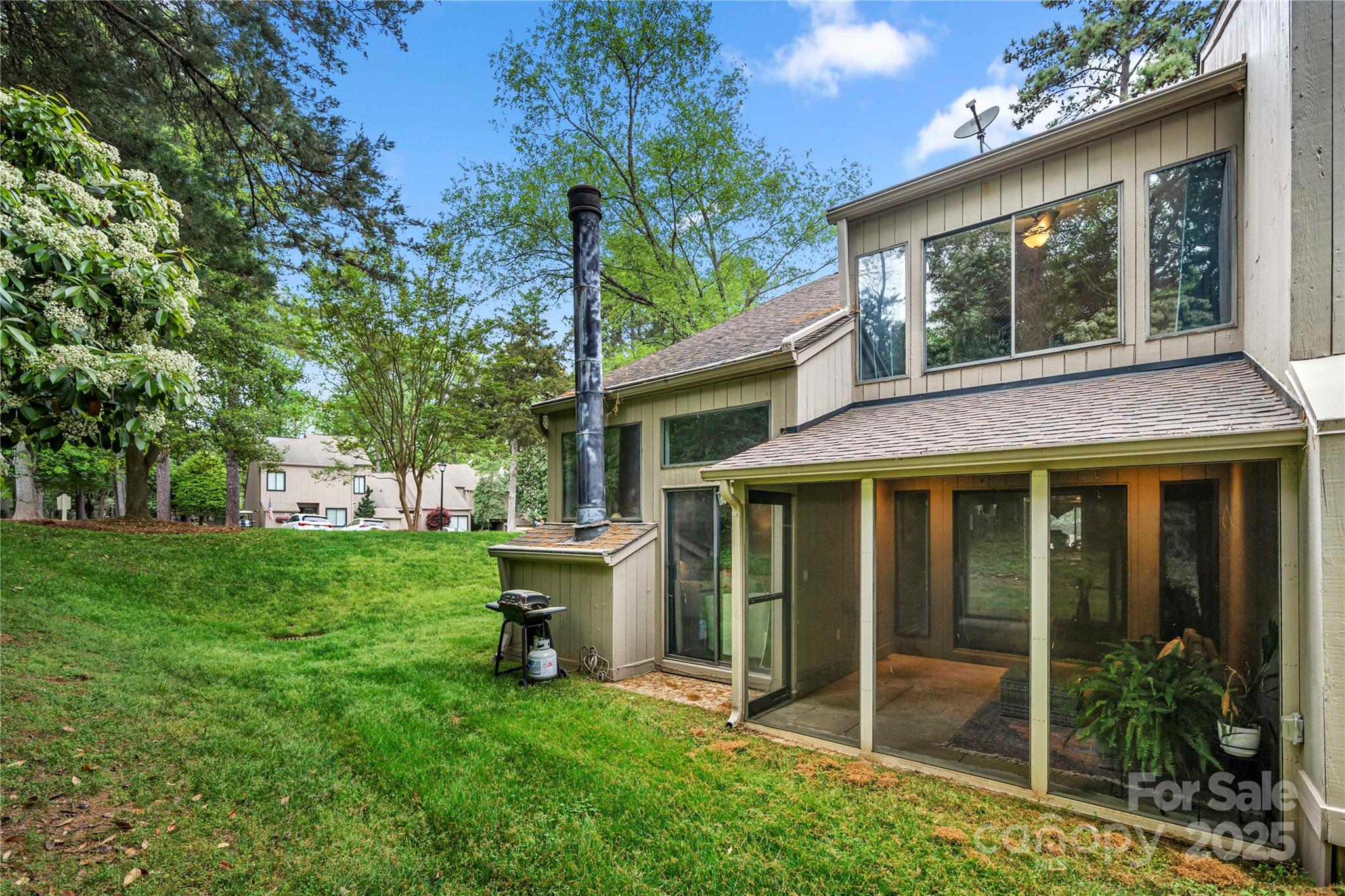 181 Riverview Terrace Clover, SC 29710 - Photo 36 of 43 a view of a house with backyard porch and garden