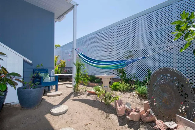 a building outdoor space with potted plants