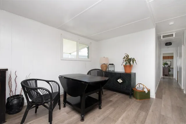 a room with a table and chairs