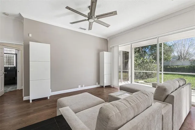 a kitchen with a sink and wooden cabinets