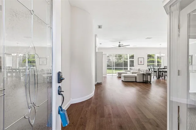 a bathroom with a shower and a mirror