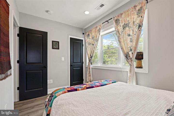 1634 Ridge Place Southeast Washington, DC 20020 - Photo 16 of 27 a bedroom with a bed and a window