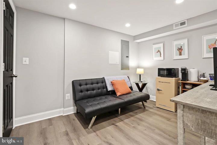 1634 Ridge Place Southeast Washington, DC 20020 - Photo 21 of 27 a living room with furniture and a flat screen tv