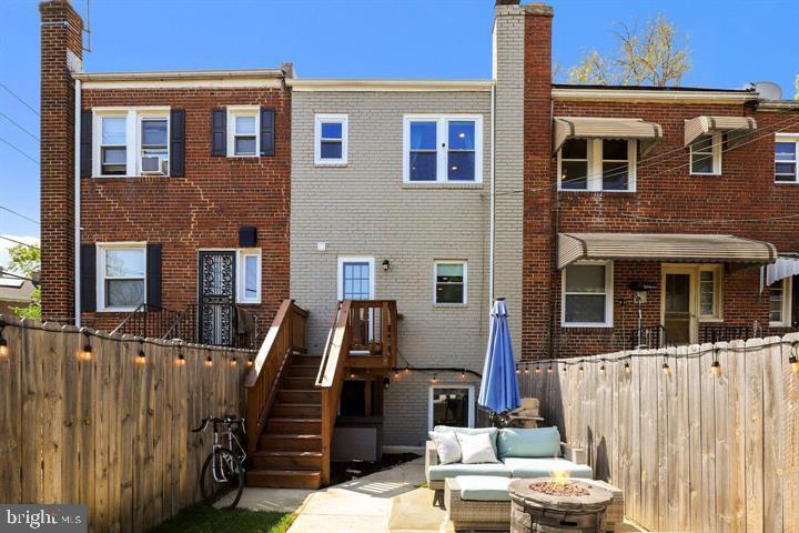 1634 Ridge Place Southeast Washington, DC 20020 - Photo 25 of 27 a view of a house with a sink and a wooden fence