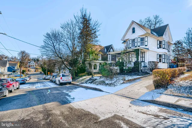 a view of a street with cars
