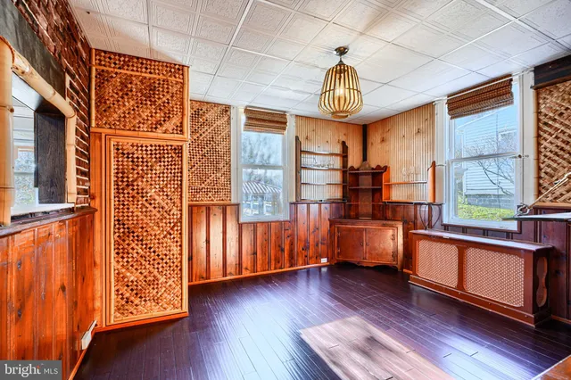 a view of entryway with wooden floor