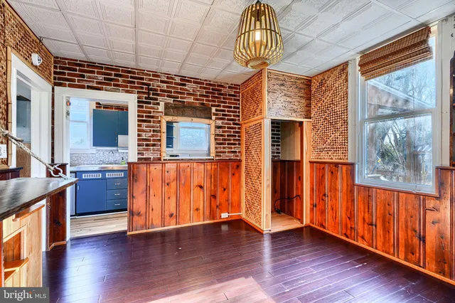 a kitchen with a sink stove and refrigerator