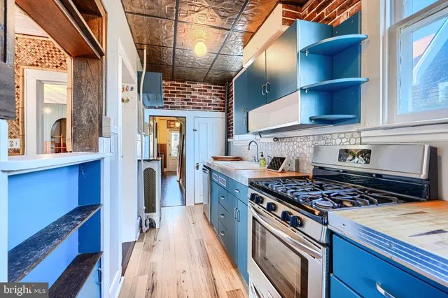 a view of a room with projector and fan