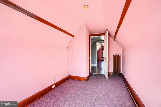 a view of a porch with wooden floor