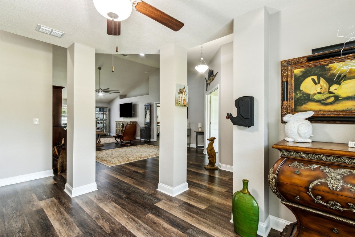 88033 Maybourne Road Yulee, FL 32097 - Photo 12 of 42 a view of a livingroom with wooden floor