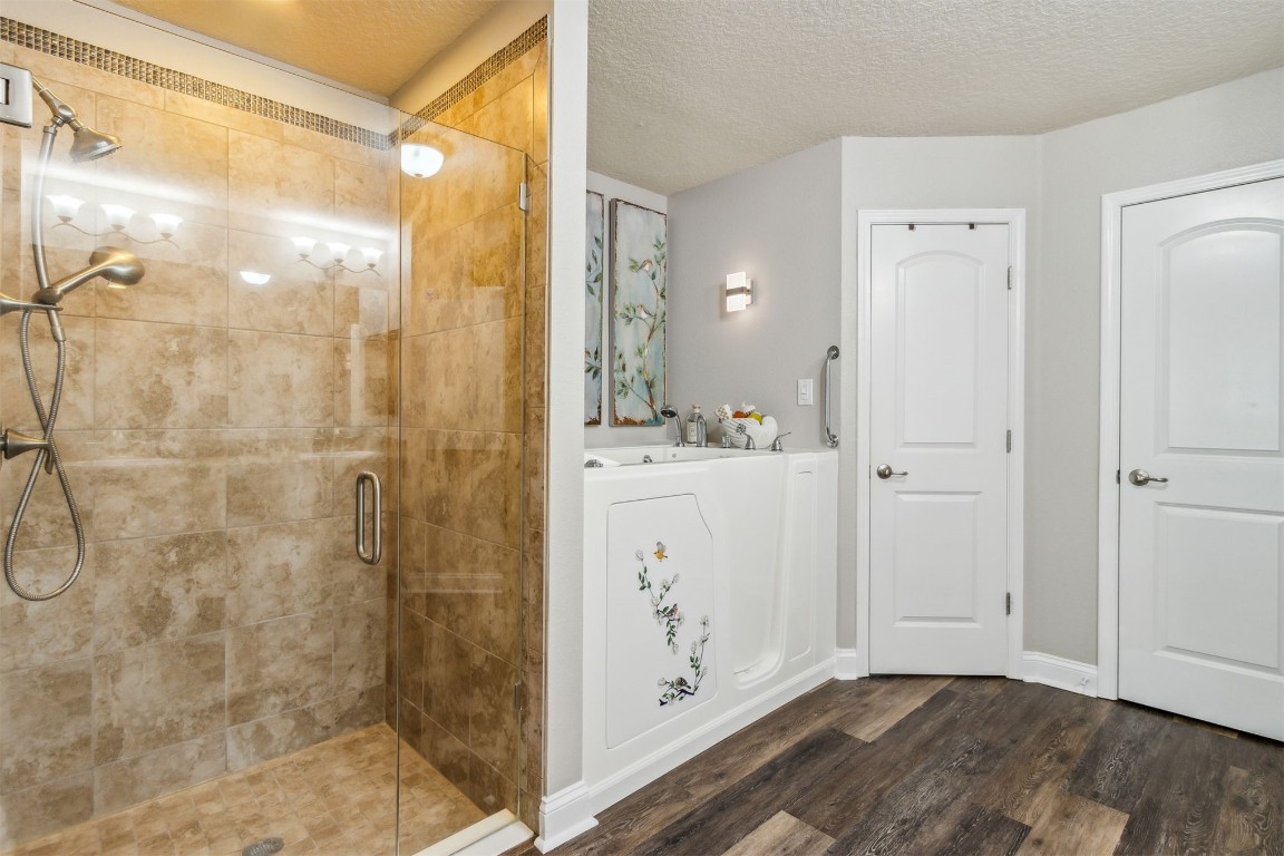 88033 Maybourne Road Yulee, FL 32097 - Photo 24 of 42 a bathroom with a shower and a sink