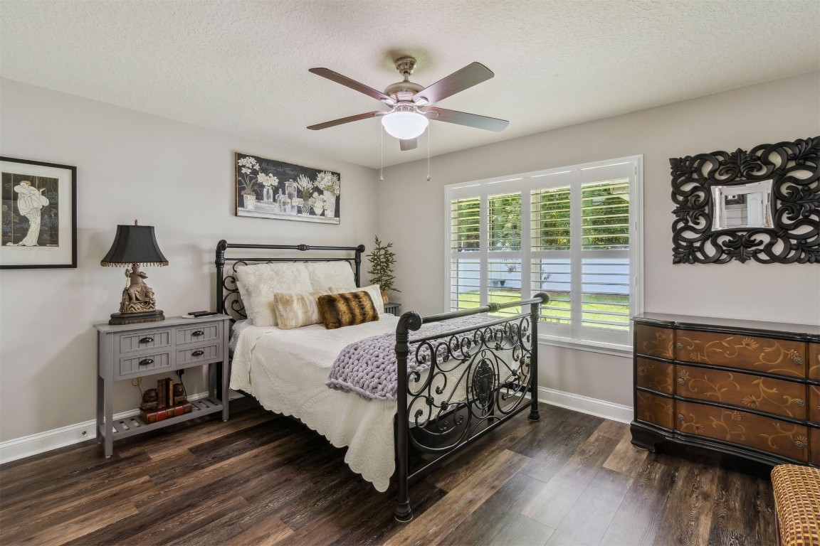 88033 Maybourne Road Yulee, FL 32097 - Photo 25 of 42 a bed room with a bed and a window