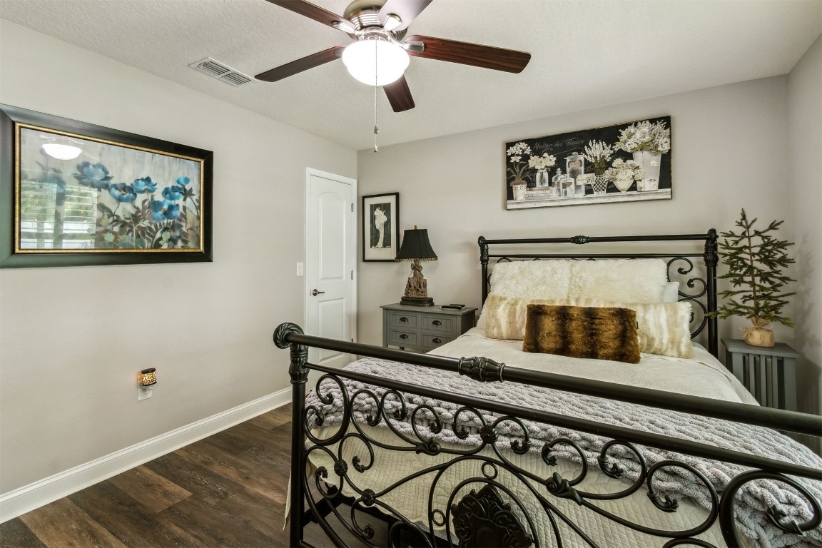 88033 Maybourne Road Yulee, FL 32097 - Photo 26 of 42 a living room with furniture and a fireplace