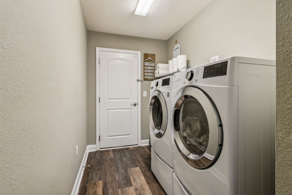 88033 Maybourne Road Yulee, FL 32097 - Photo 33 of 42 a utility room with dryer and washer