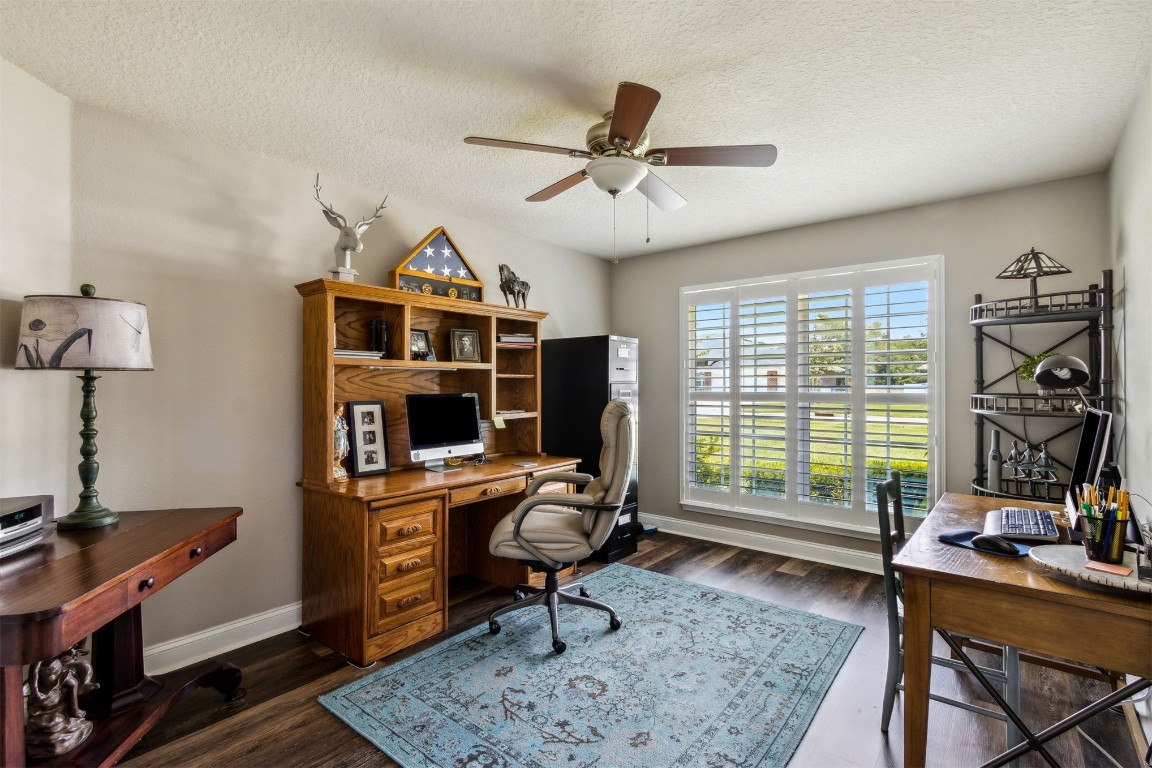 88033 Maybourne Road Yulee, FL 32097 - Photo 36 of 42 a view of a workspace with furniture and a window