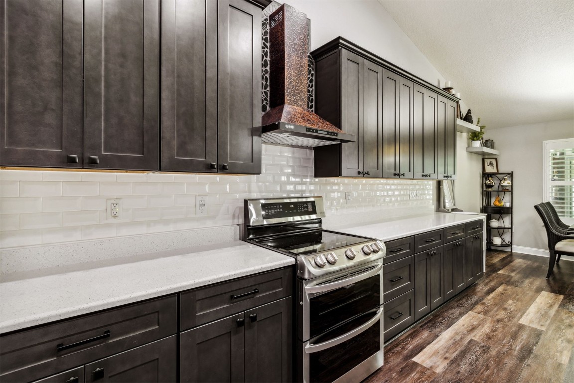 88033 Maybourne Road Yulee, FL 32097 - Photo 6 of 42 a kitchen with a stove and a sink