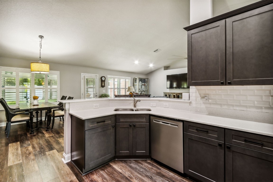 88033 Maybourne Road Yulee, FL 32097 - Photo 8 of 42 a kitchen with a sink and cabinets