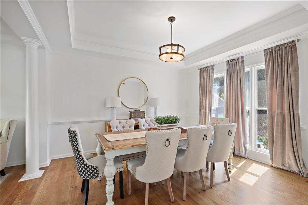 3038 Fairhaven Ridge Northwest Kennesaw, GA 30144 - Photo 12 of 55 a view of a dining room with furniture window and wooden floor