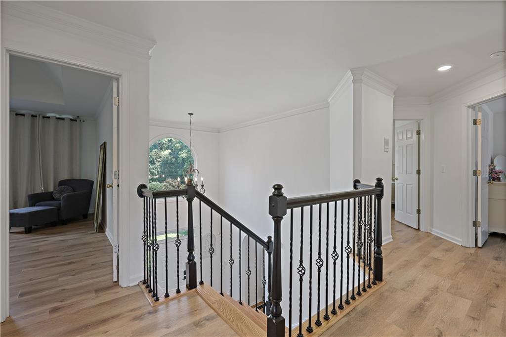 3038 Fairhaven Ridge Northwest Kennesaw, GA 30144 - Photo 26 of 55 a view of a porch with furniture and wooden floor
