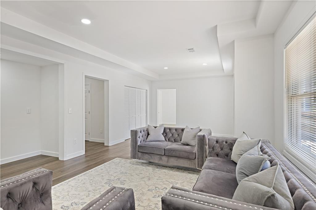 3038 Fairhaven Ridge Northwest Kennesaw, GA 30144 - Photo 32 of 55 a living room with furniture and a window