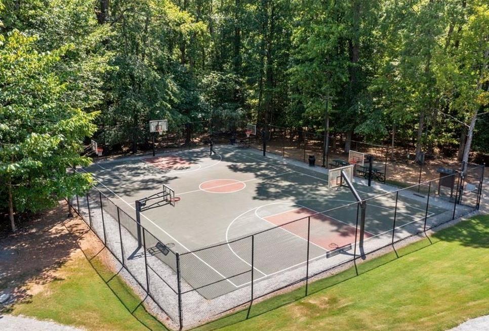 3038 Fairhaven Ridge Northwest Kennesaw, GA 30144 - Photo 54 of 55 a view of a backyard with table and chairs