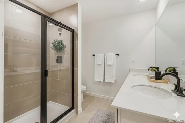 a bathroom with a sink and a shower