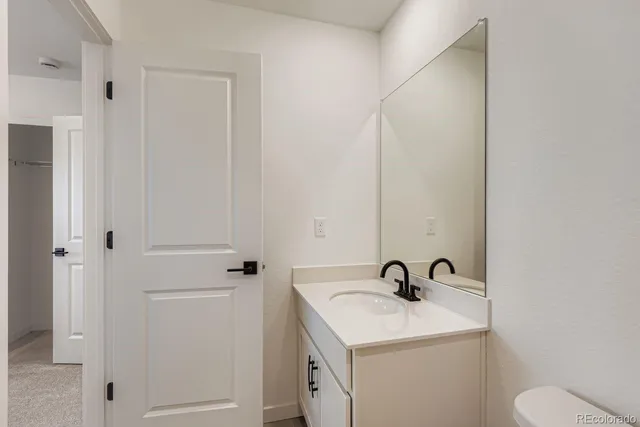 a view of a sink and a mirror