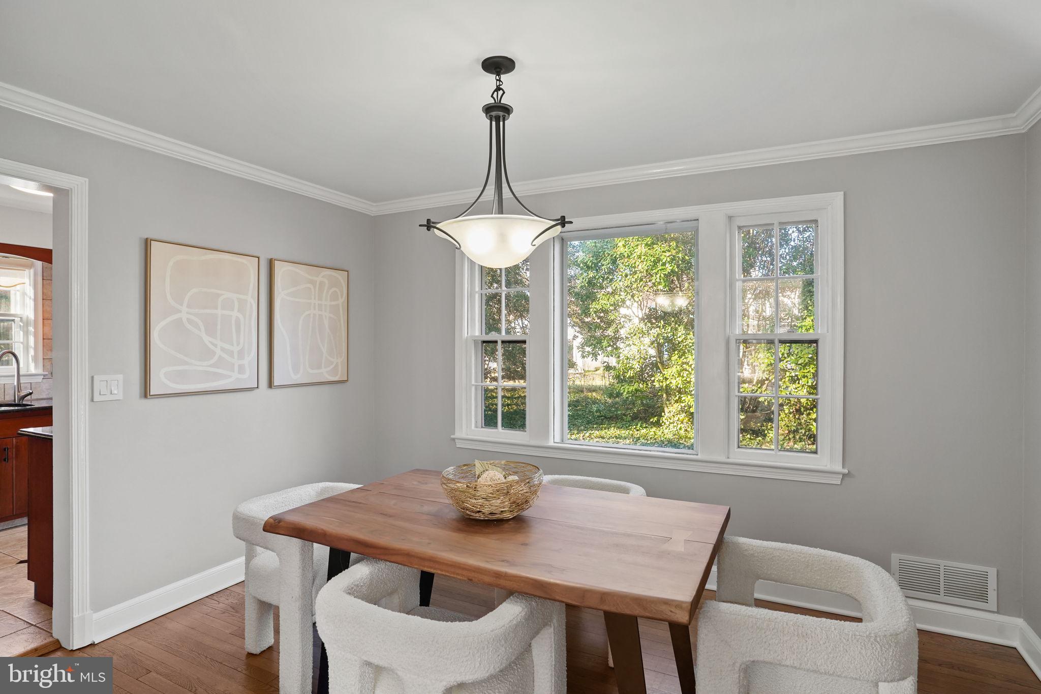 406 West Braddock Road Alexandria, VA 22302 - Photo 9 of 56 Formal dining room natural light