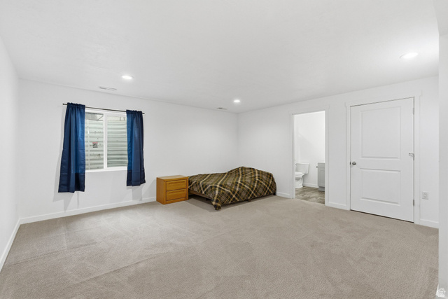 3808 Galatia Road Magna, UT 84044 - Photo 34 of 59 Spacious room featuring light-colored carpeting and white walls