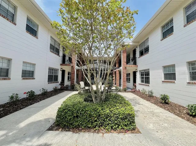 a view of a porch with couches