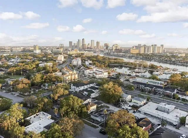 an aerial view of a city with lots of residential buildings