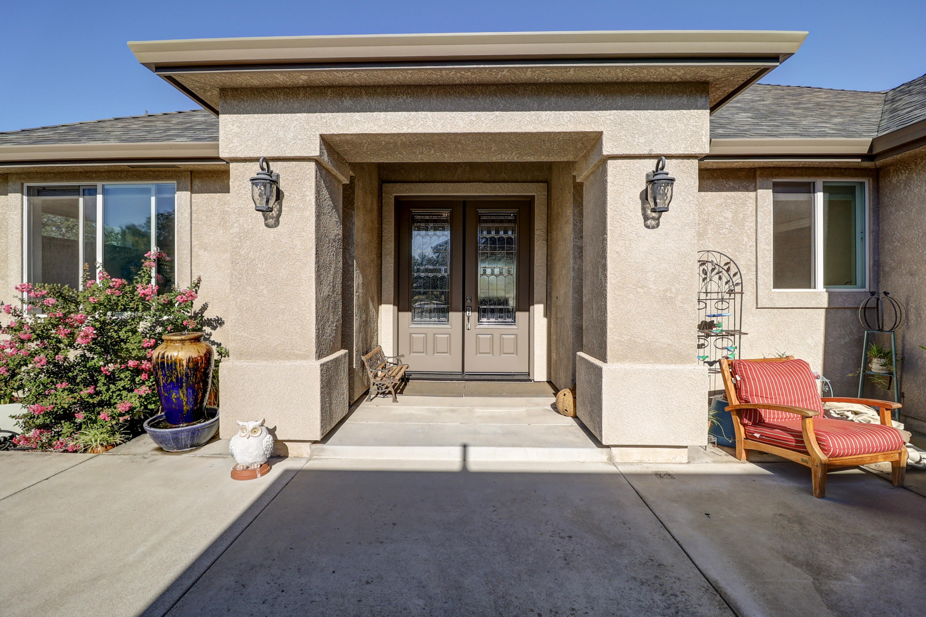 21089 Falling Leaf Road Redding, CA 96003 - Photo 1 of 43 a front view of a house with outdoor seating