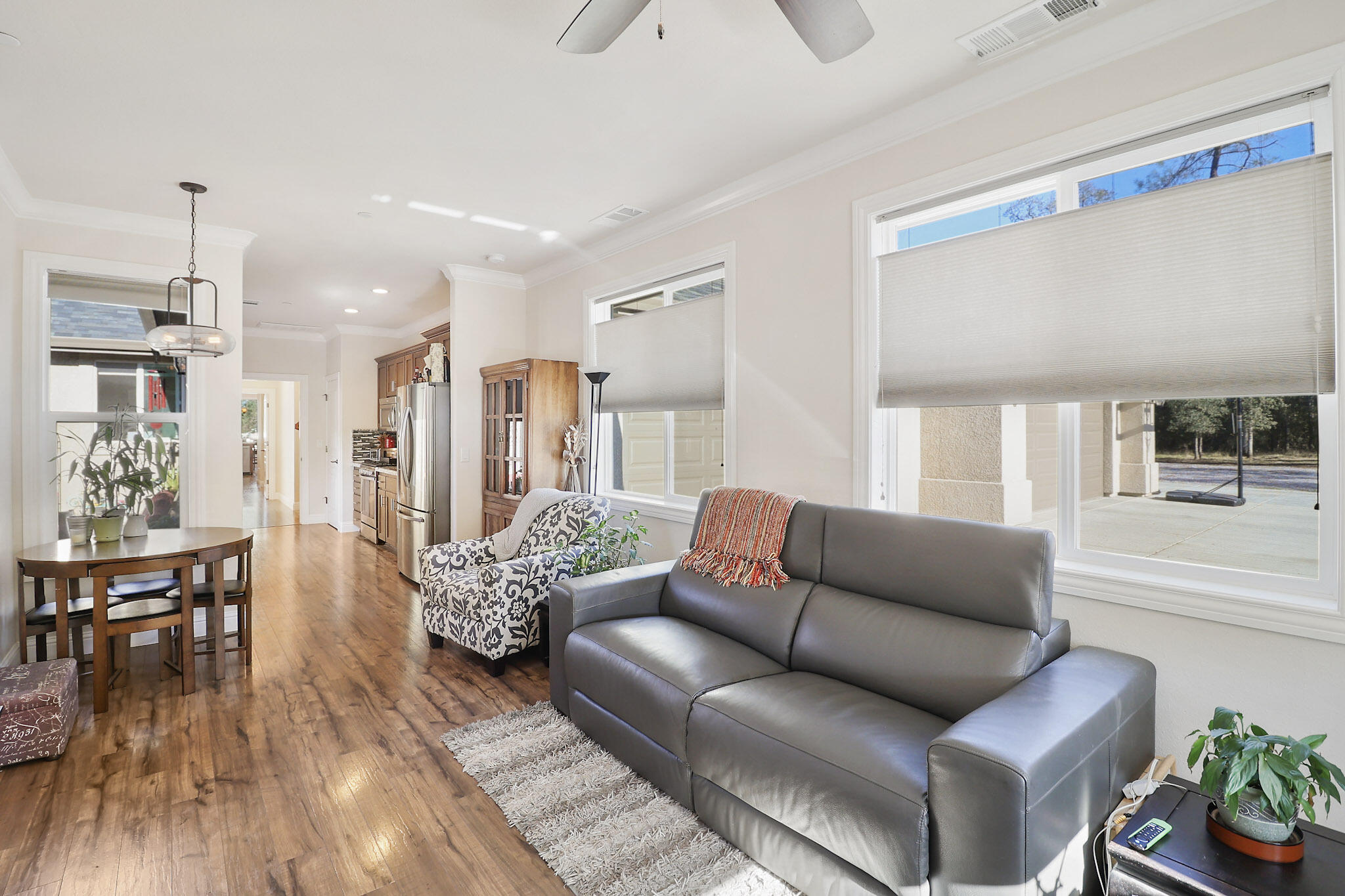 21089 Falling Leaf Road Redding, CA 96003 - Photo 25 of 43 a living room with furniture and wooden floor
