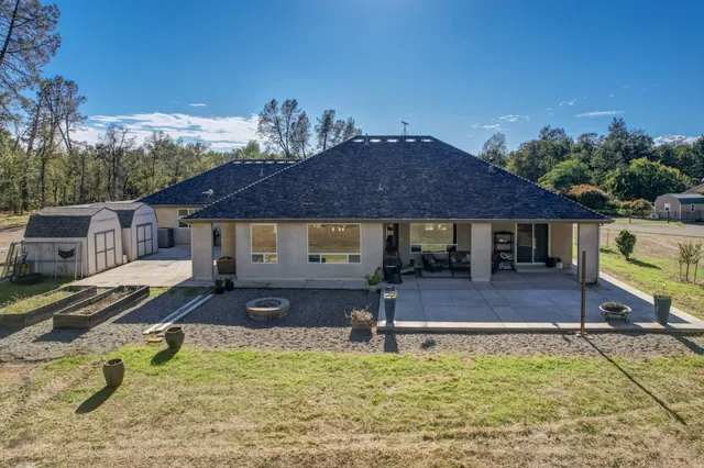 a front view of house with a yard
