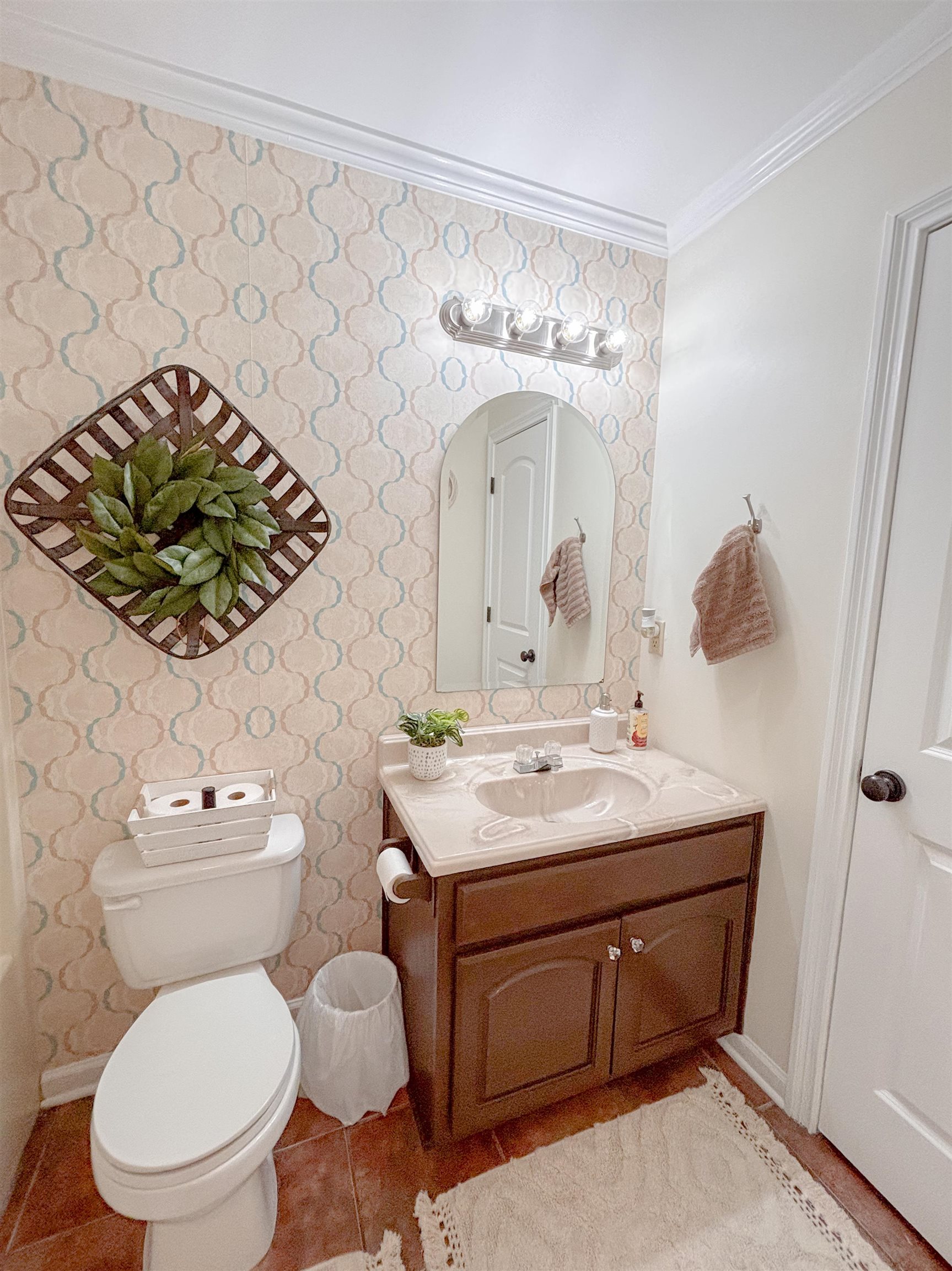 2933 Holly Grove Road Covington, TN 38019 - Photo 15 of 22 Bathroom featuring ornamental molding, toilet, and large vanity