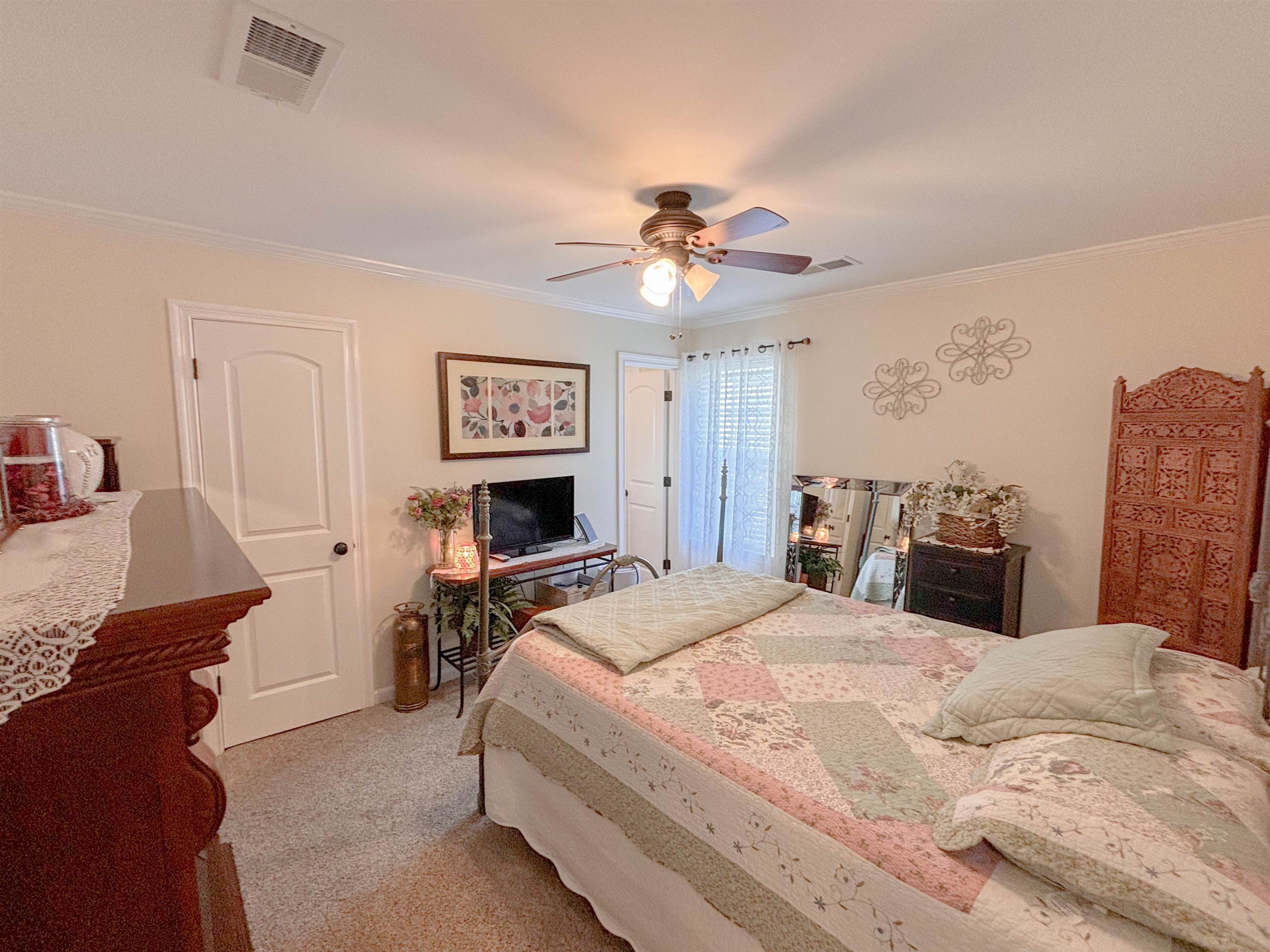 2933 Holly Grove Road Covington, TN 38019 - Photo 9 of 22 Bedroom featuring carpet and ceiling fan