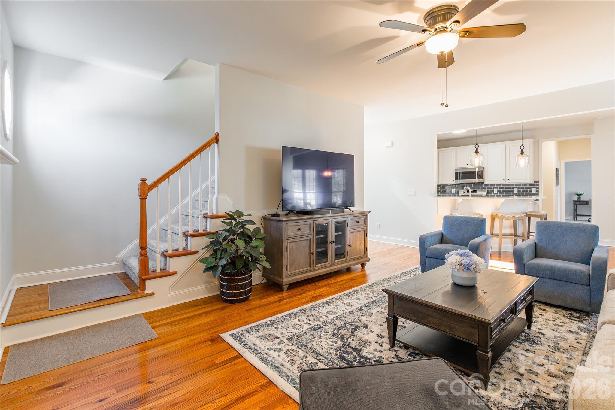16800 Hampton Trace Road Huntersville, NC 28078 - Photo 20 of 48 a living room with furniture and a wooden floor