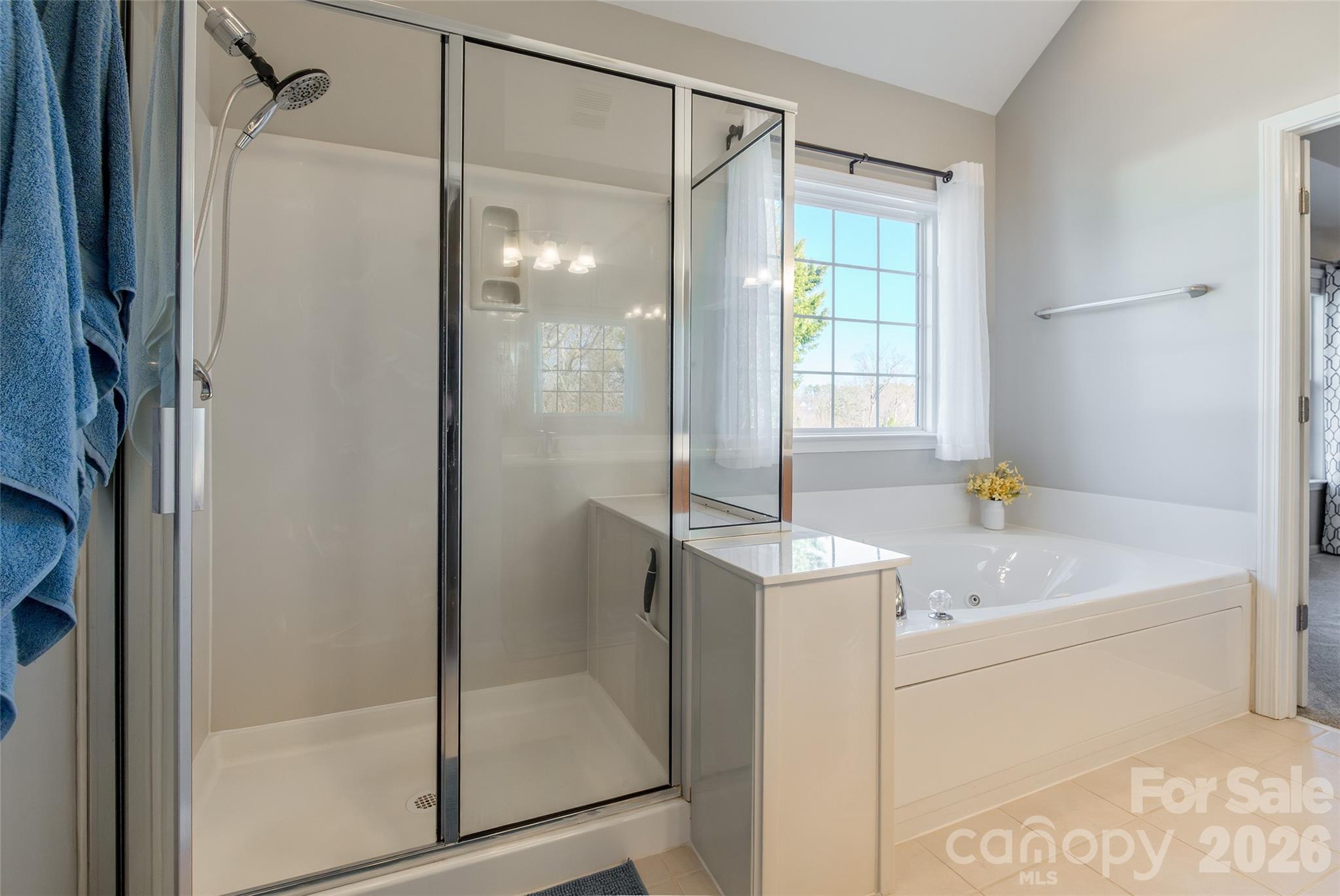 16800 Hampton Trace Road Huntersville, NC 28078 - Photo 27 of 48 a bathroom with a bath tub and a shower