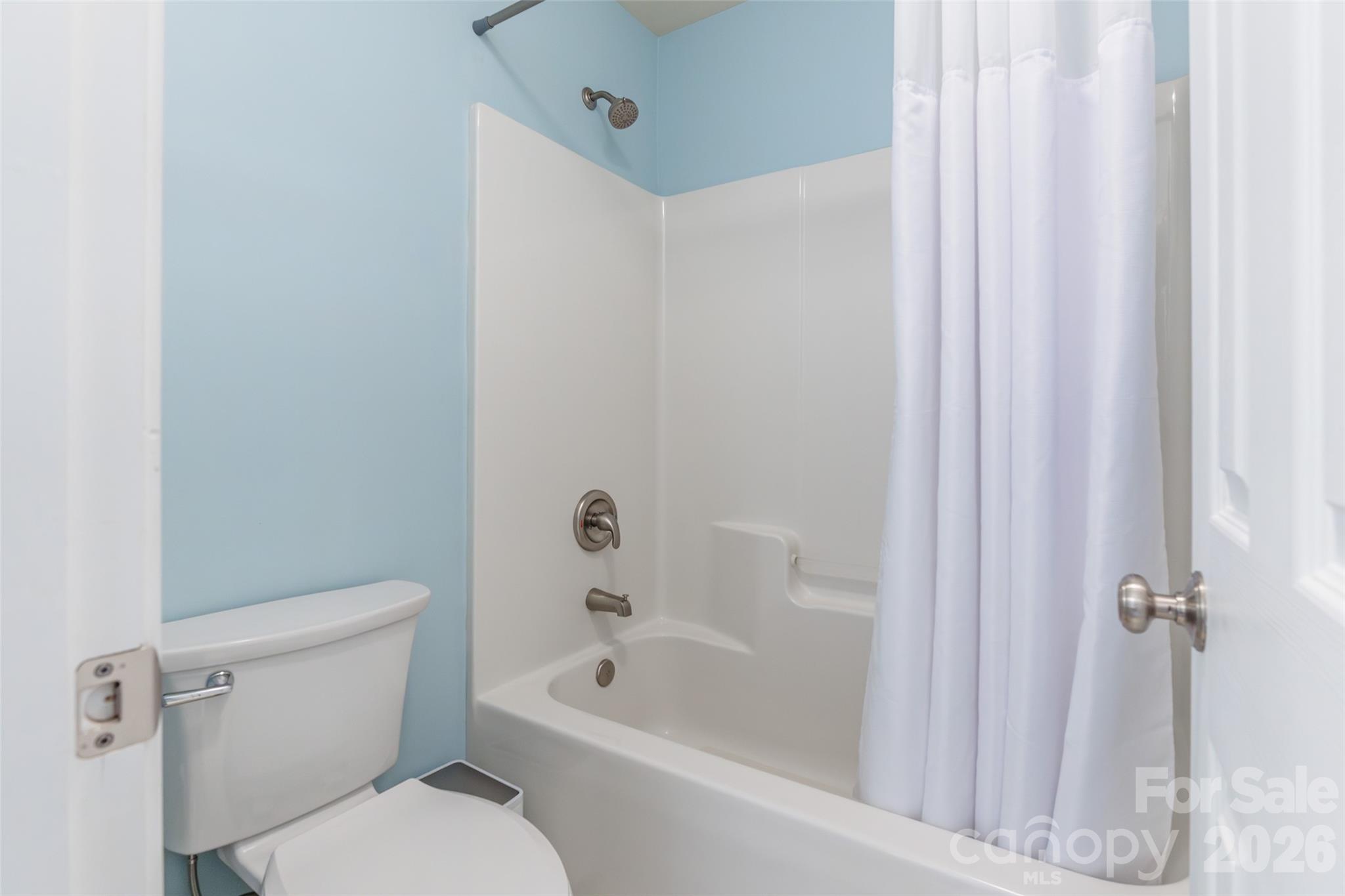 16800 Hampton Trace Road Huntersville, NC 28078 - Photo 33 of 48 a white bath tub sitting next to a white toilet