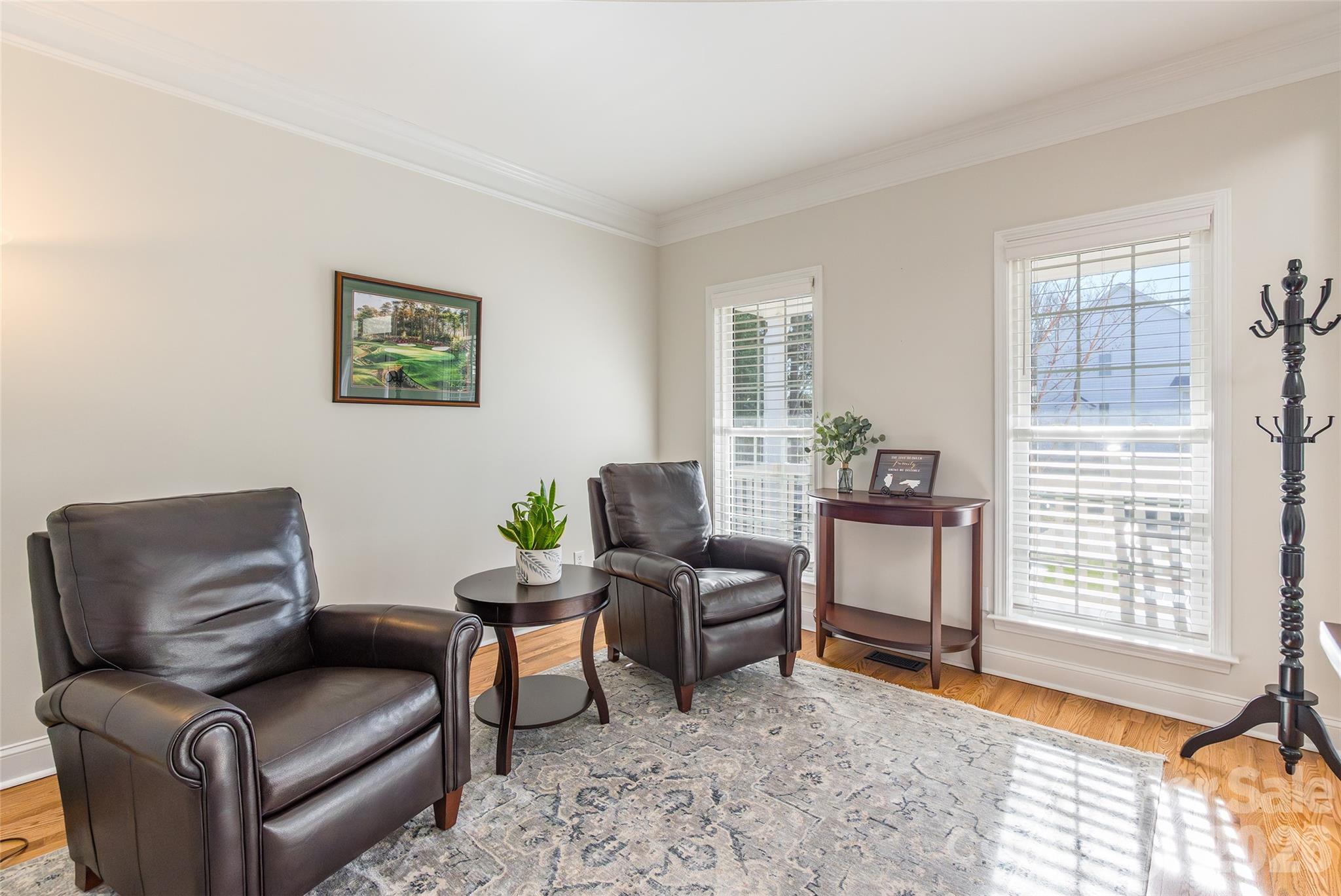 16800 Hampton Trace Road Huntersville, NC 28078 - Photo 7 of 48 a living room with furniture and a window