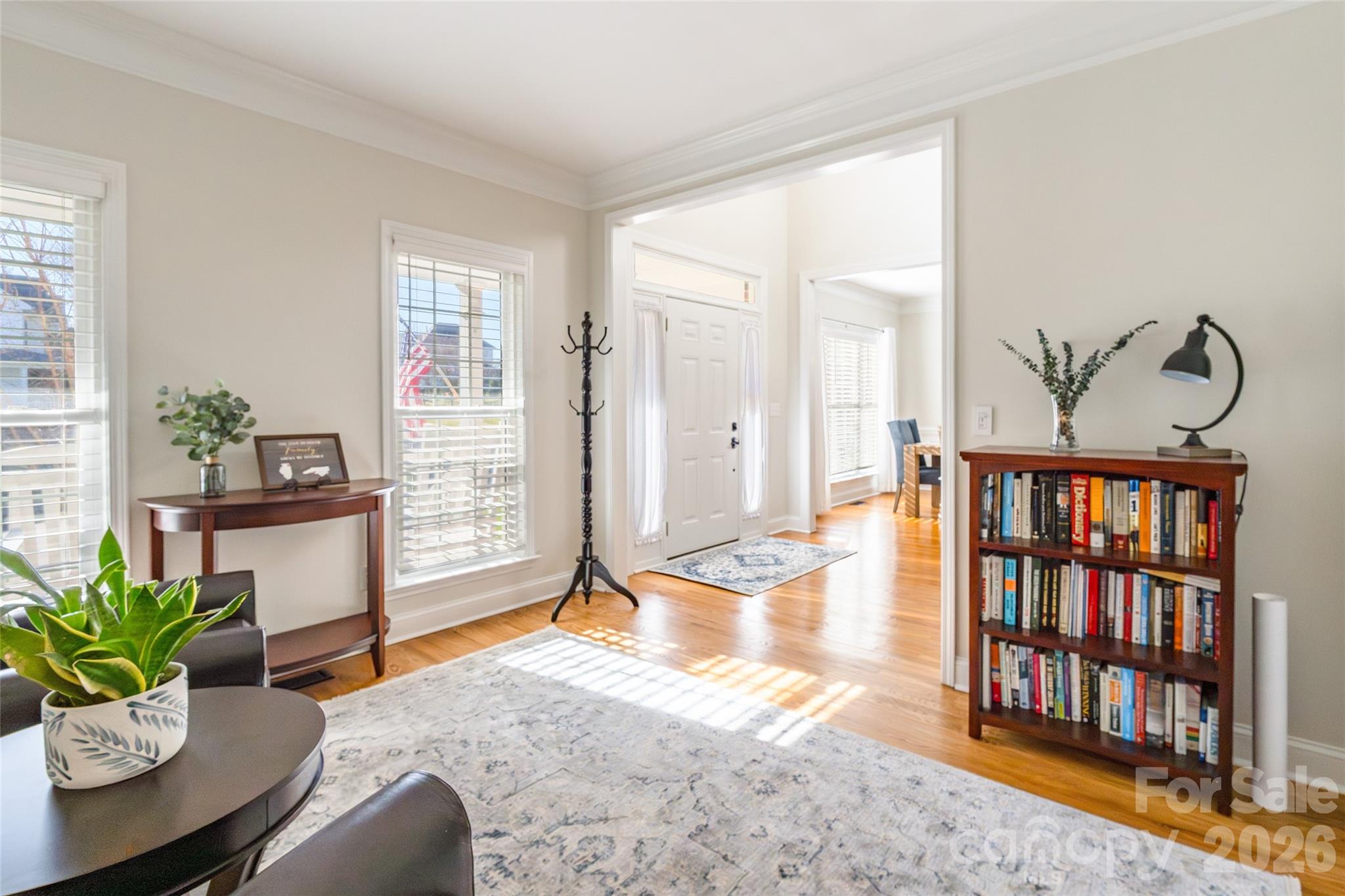 16800 Hampton Trace Road Huntersville, NC 28078 - Photo 8 of 48 a living room with furniture and a book shelf