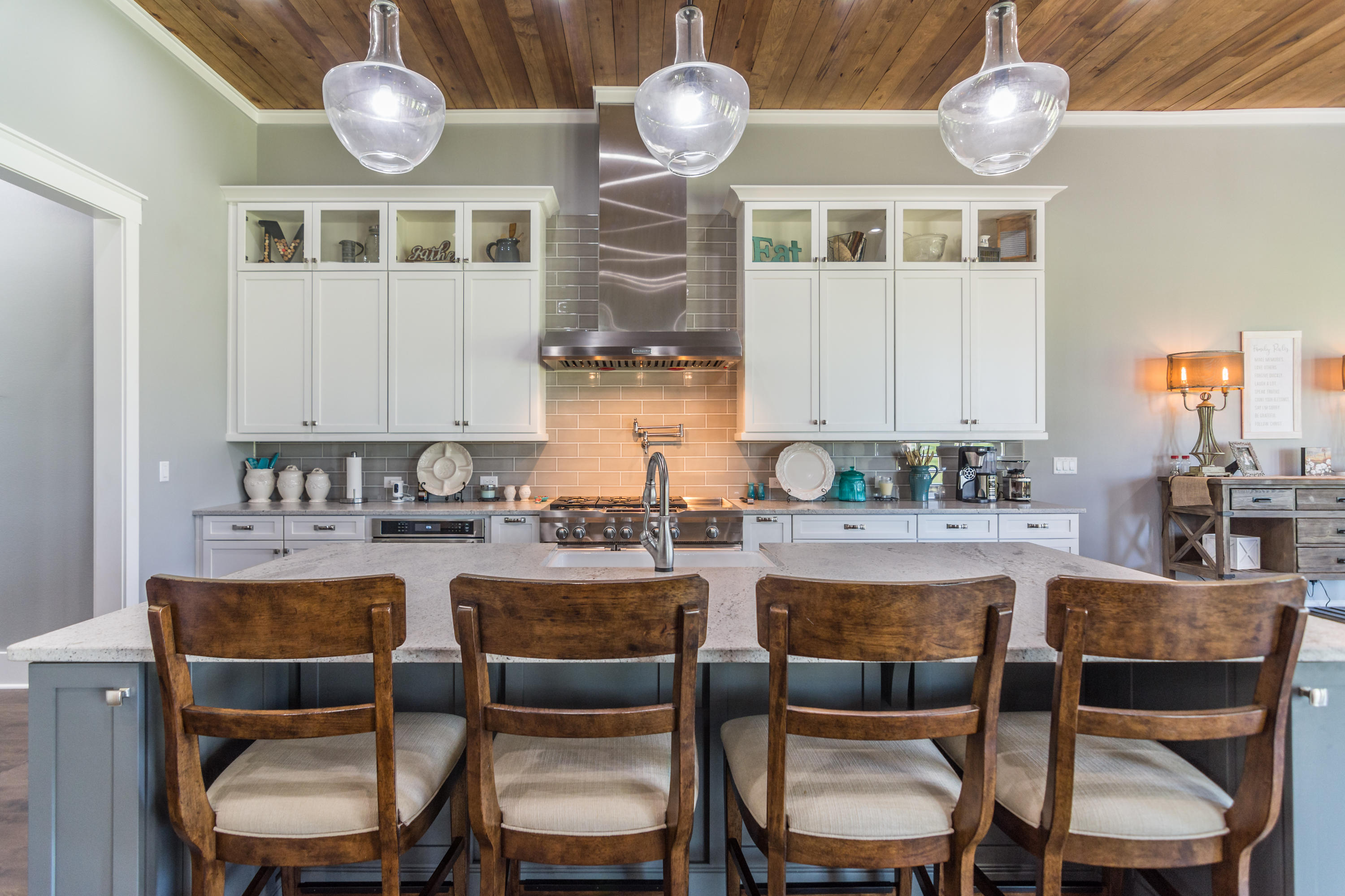 1738 Vinson Ray Road Baker, FL 32531 - Photo 14 of 50 a kitchen with a dining table and chairs