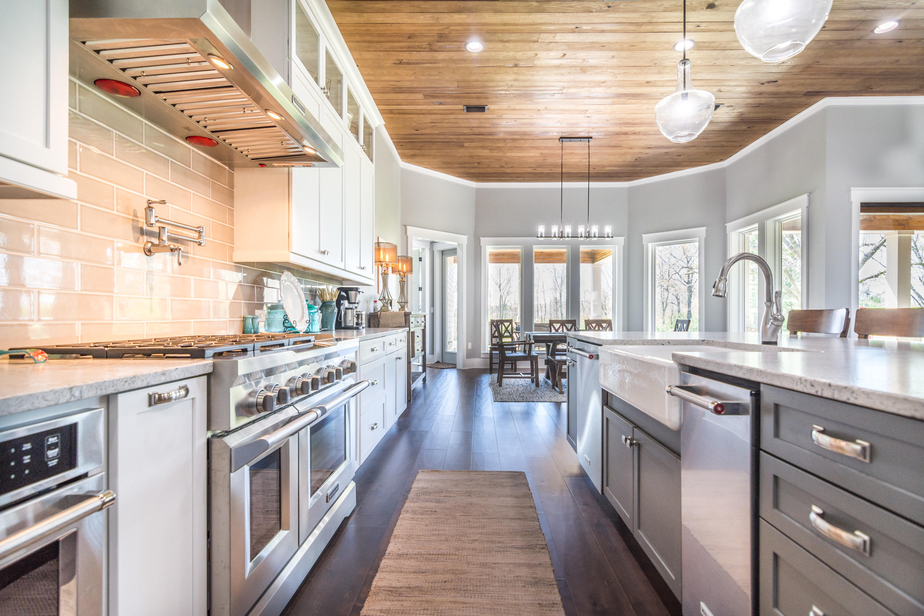 1738 Vinson Ray Road Baker, FL 32531 - Photo 16 of 50 a kitchen with stainless steel appliances granite countertop a stove and cabinets