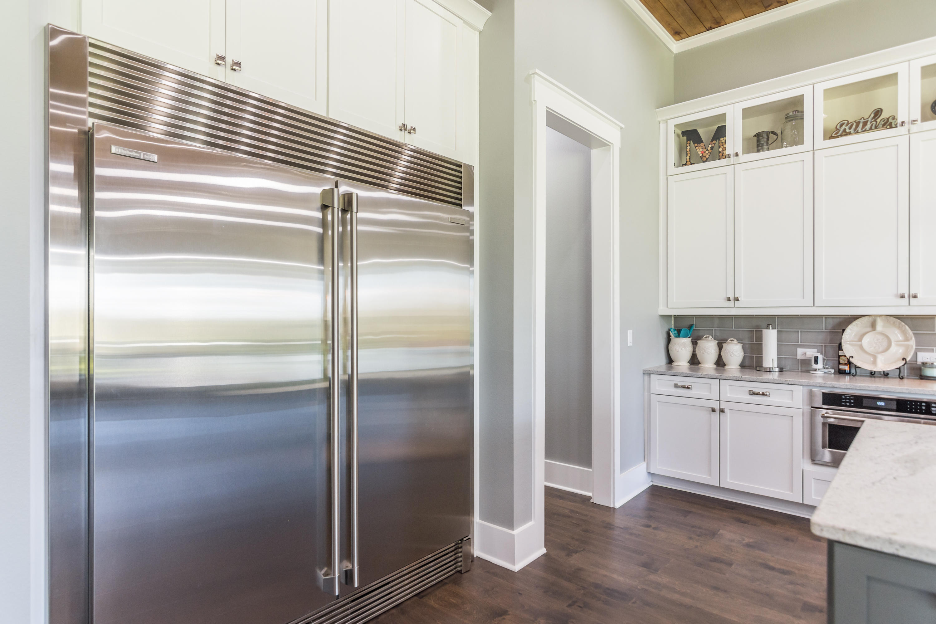 1738 Vinson Ray Road Baker, FL 32531 - Photo 17 of 50 a kitchen with cabinets and stainless steel appliances