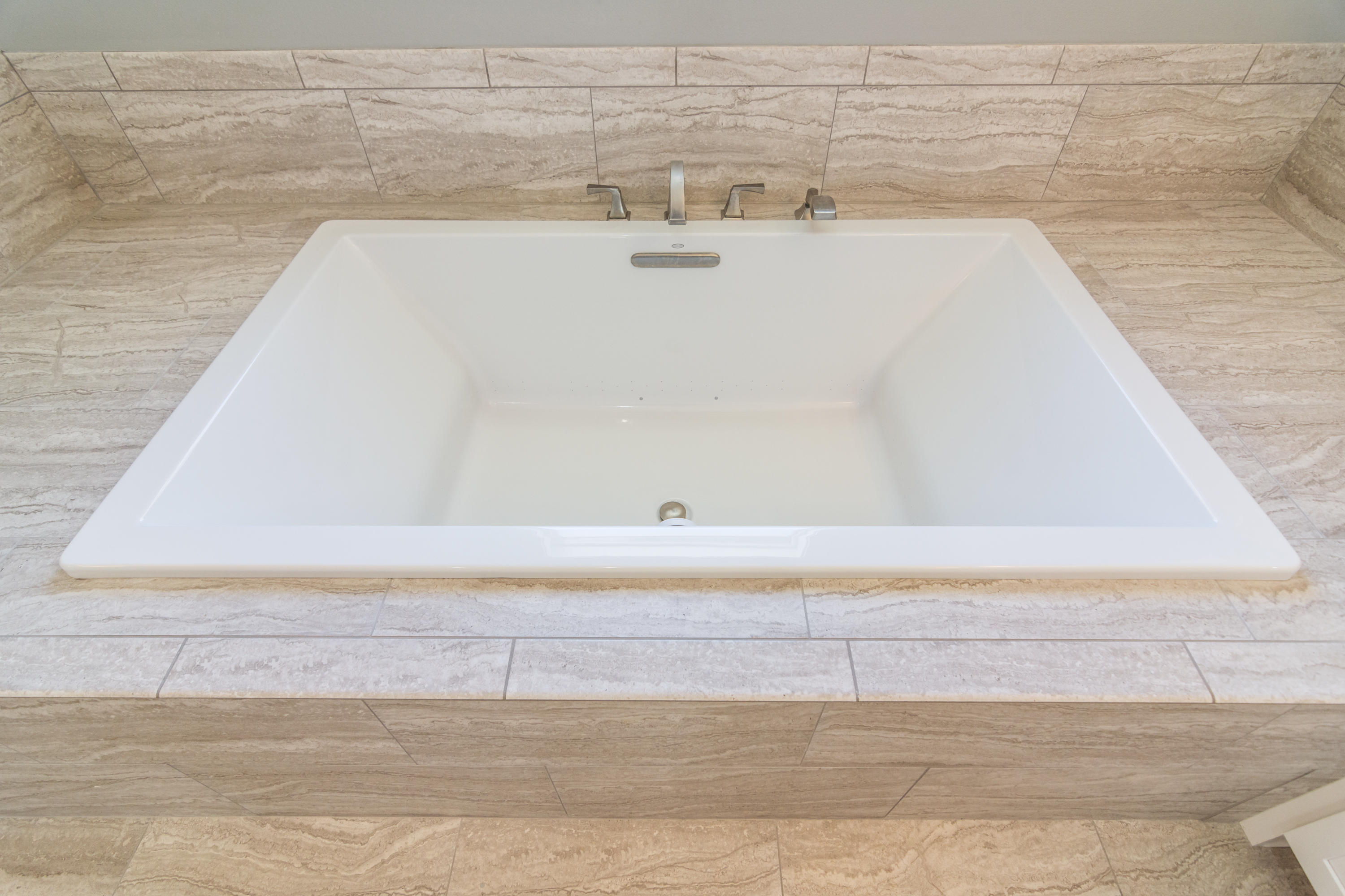 1738 Vinson Ray Road Baker, FL 32531 - Photo 26 of 50 a close up of a bathtub